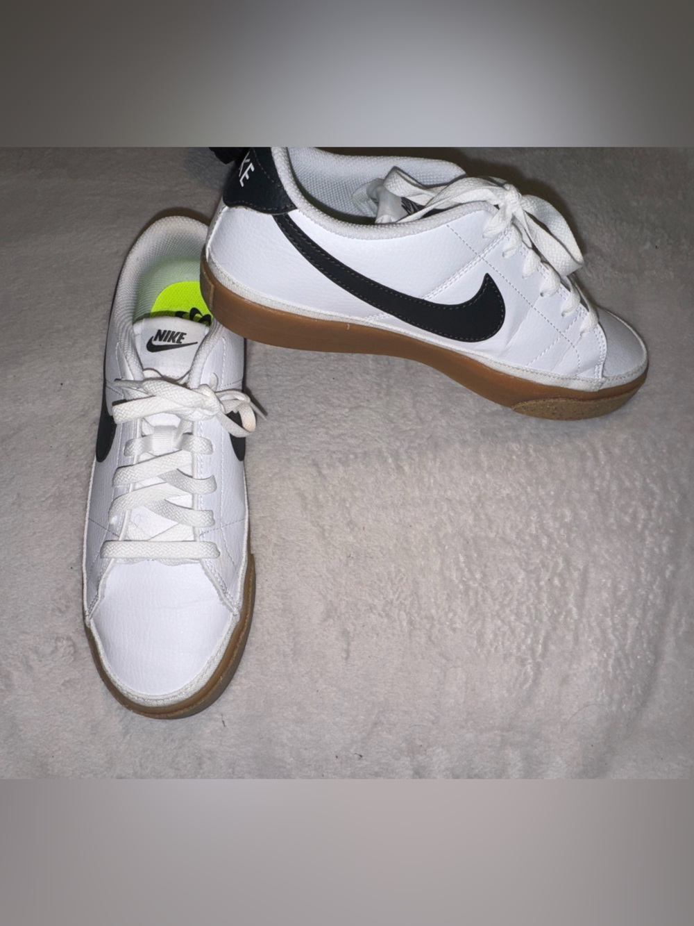 Nike White Leather Sneakers with Black Swoosh